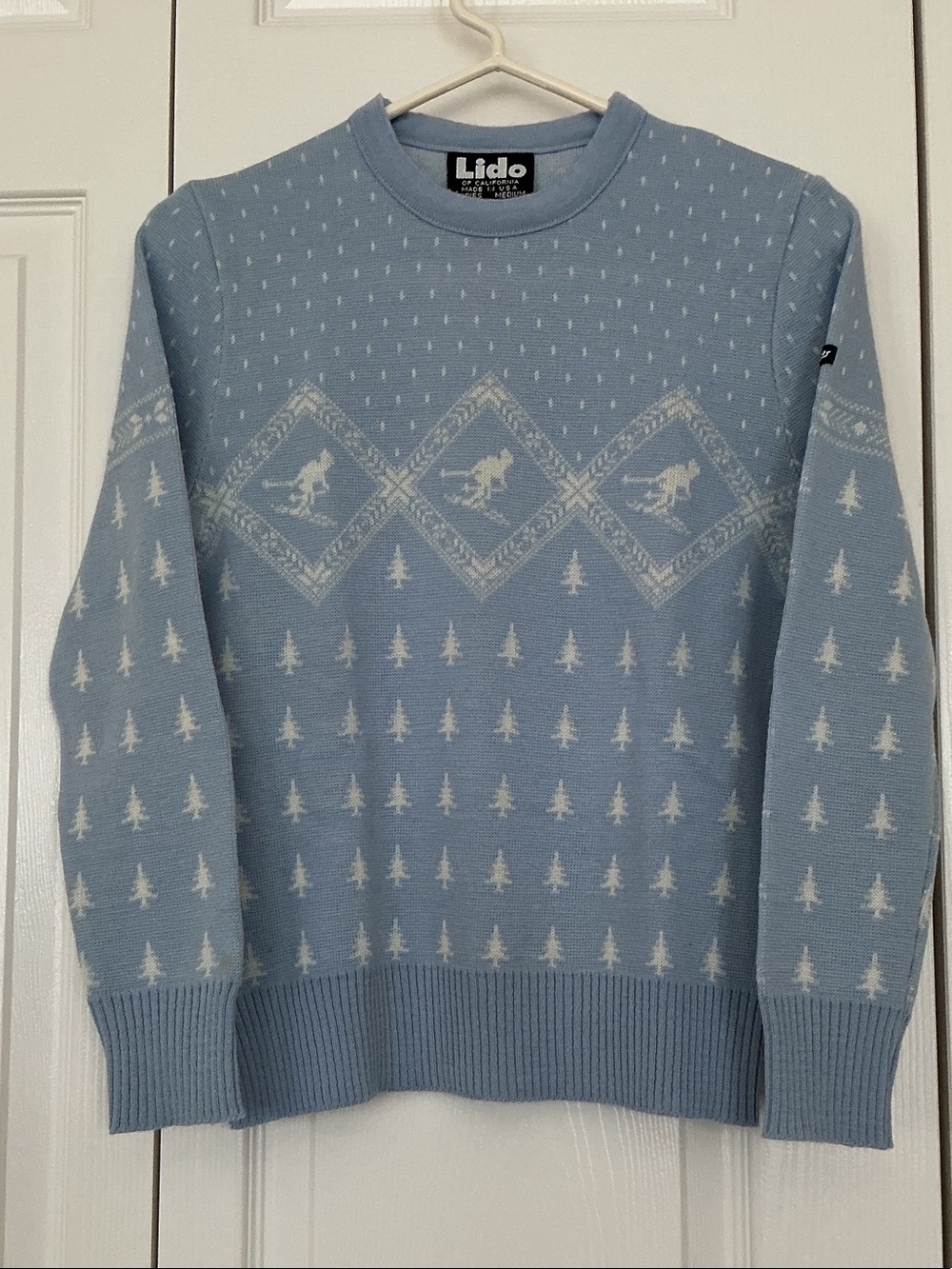 Light Blue Crewneck Sweater with White Motif